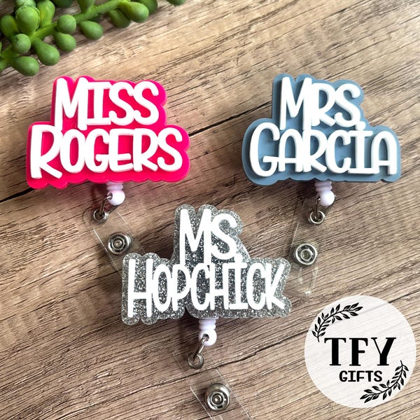 Personalized teacher badge reels with names in bright colors